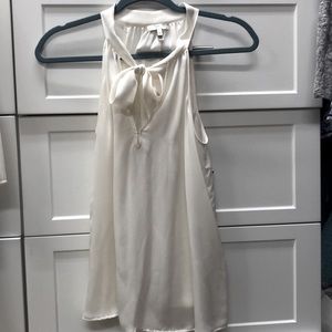 Joie silk porcelain top with bow at neck.